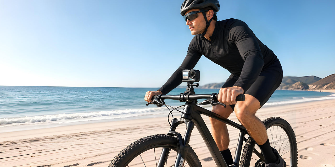 Cyclist on a coastal path with an XTRA Edge camera mounted on the bicycle handlebar